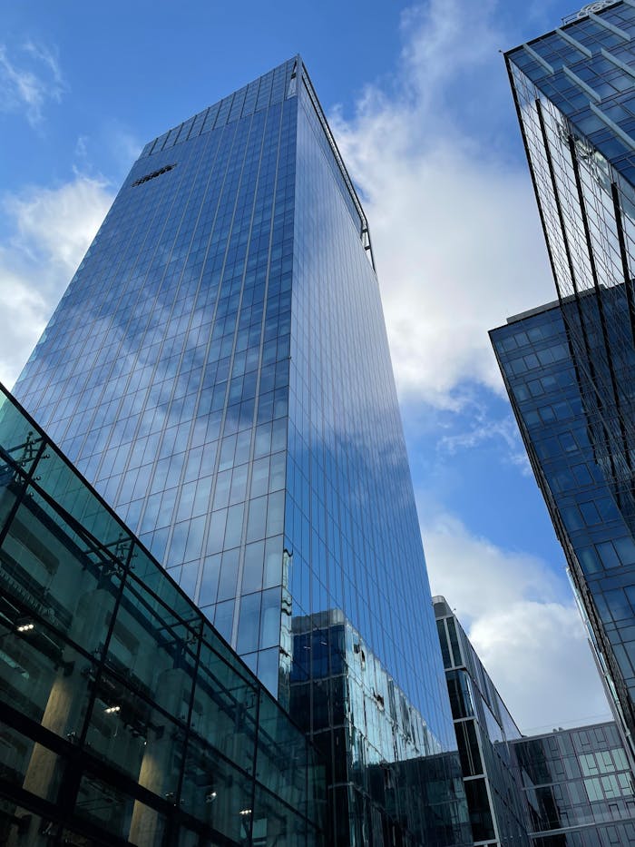 Blue Glass Walled High Rise Building